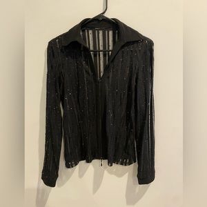 Fun sparkly black top. No tags. Fits like small.